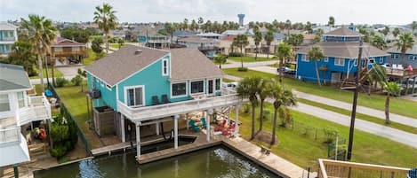 Rear of home, canal deck, boat slip and side yard - all fenced! Near the bay!