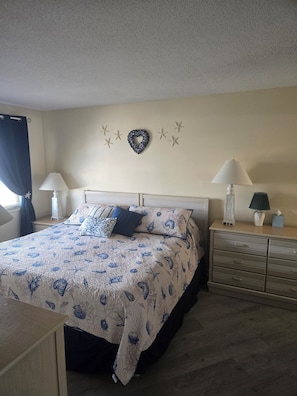 King sized bed. Spread and blankets changed between each renter