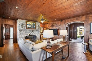 This comfy living room offers space for everyone to gather!