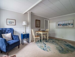 Game room/Reading room with chess/checker table.  Book shelves and games.