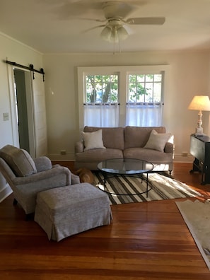 Relax on the feather sofa and chair in the living room!