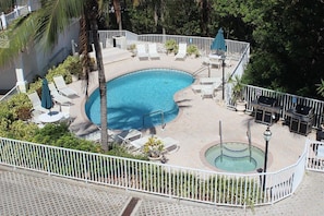 View of the heated pool & spa from our master bedroom deck