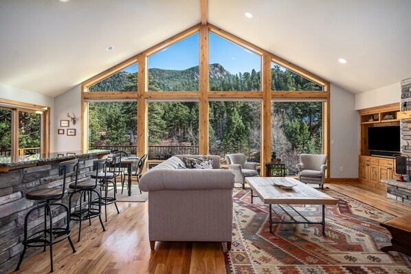 Picturesque views of the river and mountains from your living room.