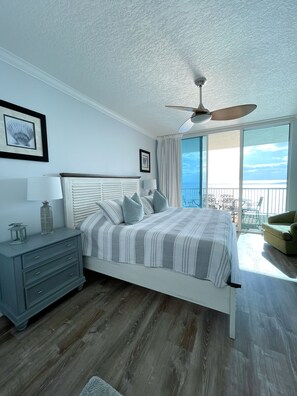 Spacious Master bedroom with ocean view and direct access to the balcony.