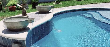 Private Pool in a fenced-in yard.