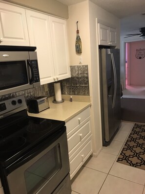 Galley kitchen stainless appliances