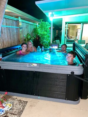 Night cap... guests enjoying a relaxing massage in hot tub!
