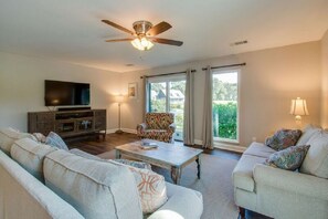 Family room with golf and lagoon views