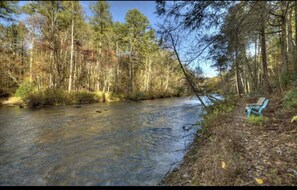 Walk down from cabin to the creek—but wear your sturdy shoes