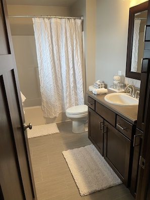 Master bathroom off master bedroom. 