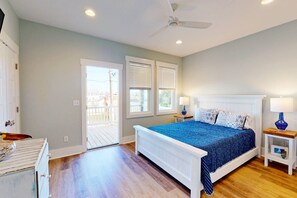 The owner suite has a private deck and a queen bed with an ensuite bathroom