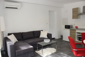 living area with convertible sofa (2 children)