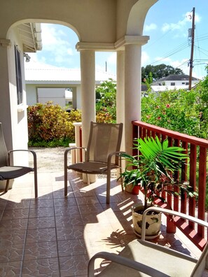 Front patio of apt #3 downstairs with 2 bedrooms and 2 bathrooms