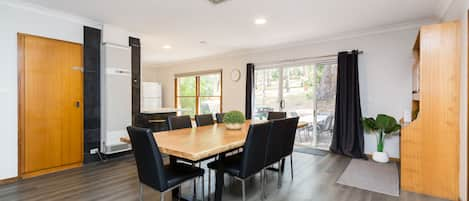 Elegant 8-seater dining area for shared meals in a stylish and spacious setting.