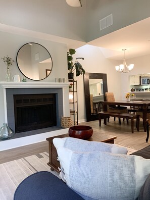 Open Floor Plan-- Living Room and Dining Room with Vaulted Ceilings 