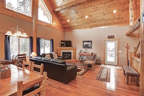 Arrow Lodge- Living room with leather furniture .