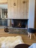 Véritable cheminée au bois avec foyer vitré panoramique 