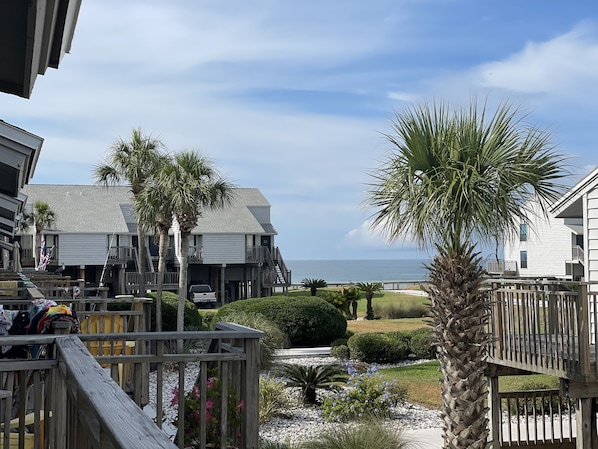 Amazing view from back deck. Steps from beach and pool yet plenty of privacy. 