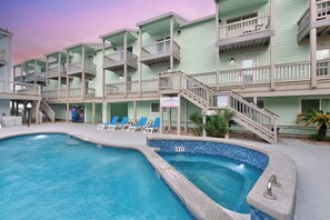 Refresh yourself in the tranquil heated pool or unwind in the community hot tub—perfect ways to relax and recharge during your stay.