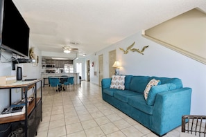 Open concept living, kitchen, and dining area