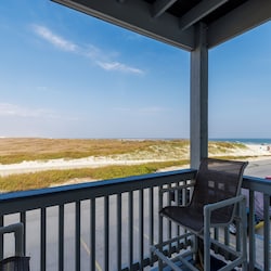 Private balcony off the living area with a great view of the beach