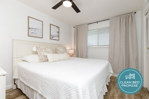 Master bedroom with king size bed and flat screen TV