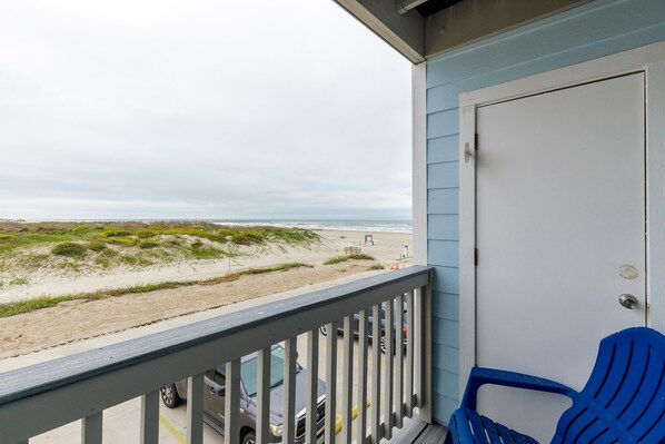 Private balcony off the living area with dune and beach views