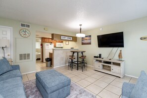 Conjoined kitchen, dining, and living area