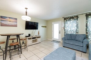 Comfortable living space with new furniture and flat screen TV to enjoy