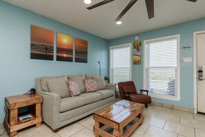 Living area featuring a comfortable inflatable queen-size sleeper sofa