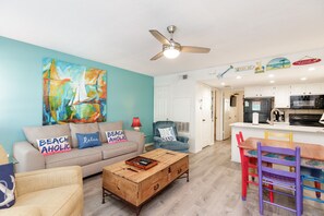 Spacious living area styled with beautiful décor for a welcoming, relaxed atmosphere