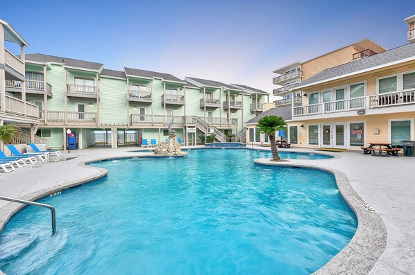 Admire the shimmering El Constante pool, perfect for refreshing dips after a long day of fun in the sun