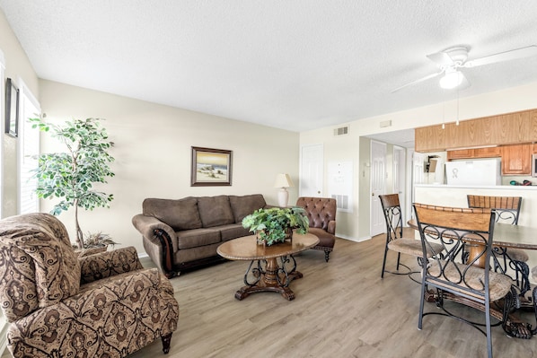 Inviting living space filled with natural light and generous seating for family comfort