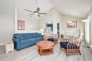 Bright living area with plenty of seating for the family