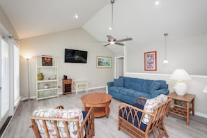 Living area with a queen size sofa sleeper and flat screen TV