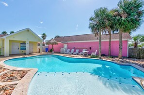 Admire the shimmering pool and experience paradise, surrounded with beautiful scenery