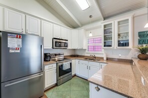 Cook&#39;s kitchen with stainless appliances