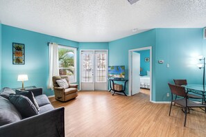 Updated living area with a queen size sleeper sofa