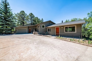 Front view of our property with big driveway.