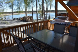 Caribou Cabin private deck with view of the Kenai River. 