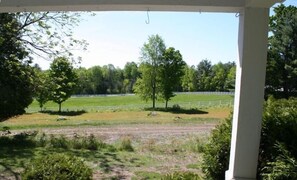 Taken from the front porch looking out to the road and the horse pasture