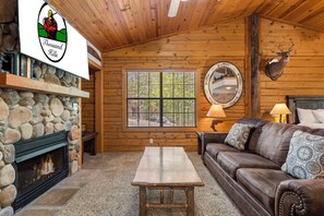 Living Area with Cable TV, Queen Sleeper Sofa, and Seasonal Gas Fireplace
