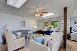 The lower level open living/sleeping space is perfect for extended family and kids.