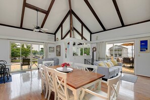 The great room on the Main Floor/Upper level has views of the Bay.