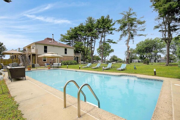 Your own private pool awaits you at this Summer Cottage steps from The Kentmorr Beach Bar and Grill!