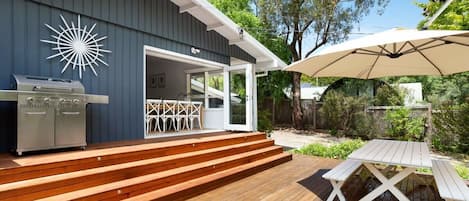 Outdoor Entertainment Area with Dining table and BBQ