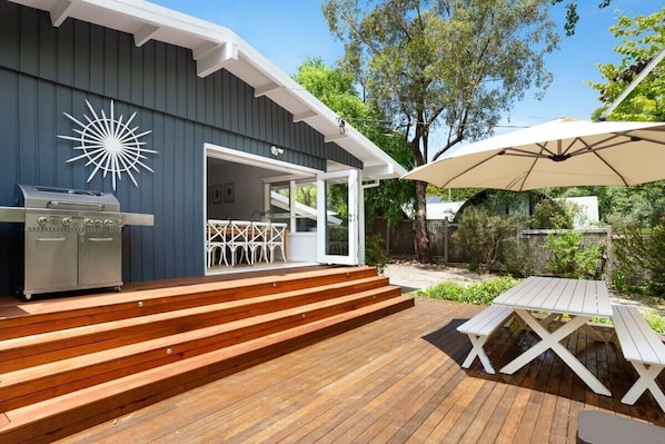 Outdoor Entertainment Area with Dining table and BBQ