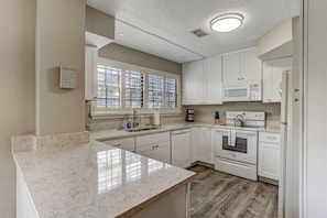 Fully Equipped, Renovated Kitchen for Convenience