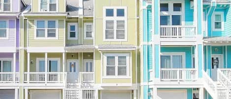 Tropical colored townhomes in Bermuda Bay