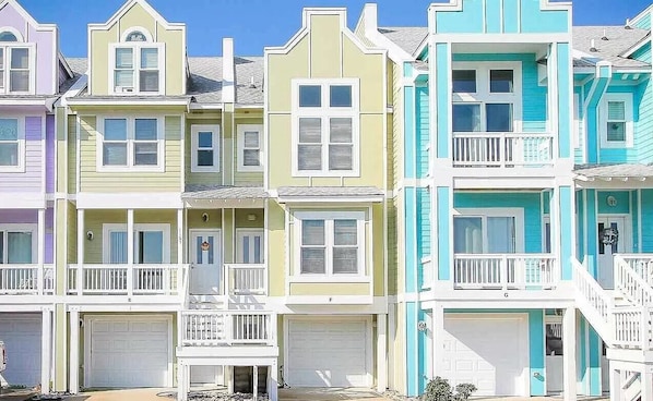 Tropical colored townhomes in Bermuda Bay 